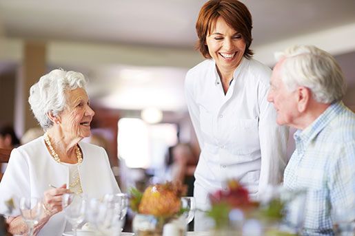 Couple smiling at a table