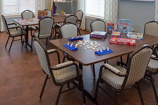 game room with scrabble at The Delaney at Parkway Lakes senior living community