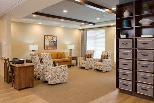 orange and yellow lobby at The Delaney at Parkway Lakes senior living community