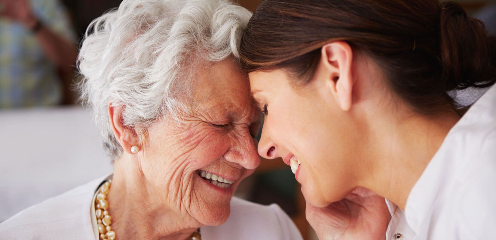 mother with daughter at The Delaney at Parkway Lakes senior living community