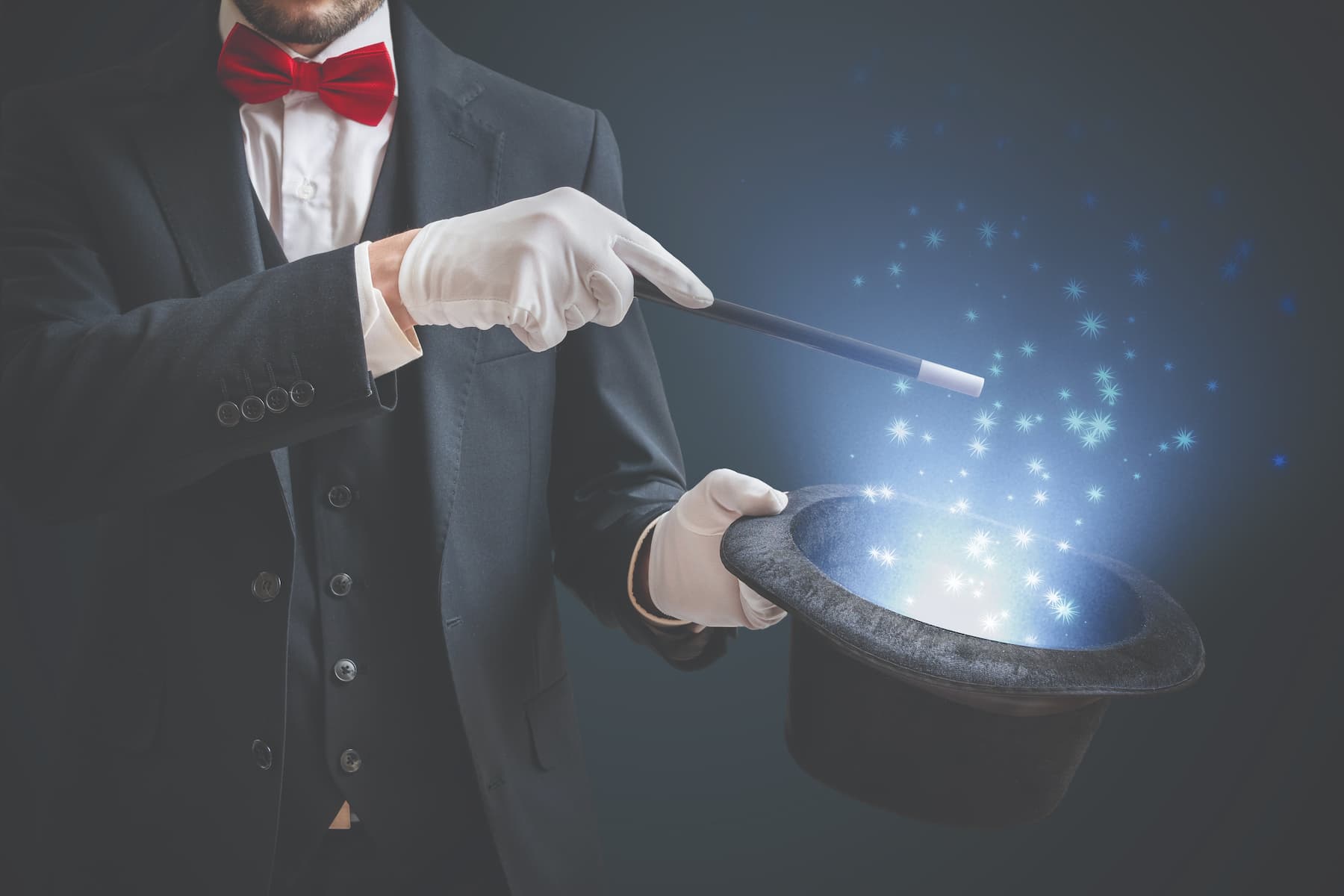 Magician with casting spell in his top hat